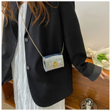 Mini bolso bandolera de piel brillante
