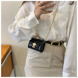Mini bolso bandolera de piel brillante