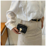 Mini bolso bandolera de piel brillante