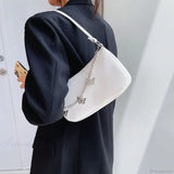 Bolso de hombro de viaje de piel sintética con cadena de mariposa.