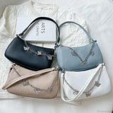 Bolso de hombro de viaje de piel sintética con cadena de mariposa.