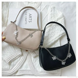 Bolso de hombro de viaje de piel sintética con cadena de mariposa.