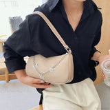 Bolso de hombro de viaje de piel sintética con cadena de mariposa.
