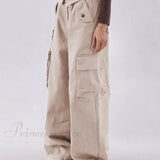 Vaqueros boyfriend verdes elegantes y holgados con botones.