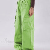 Vaqueros boyfriend verdes elegantes y holgados con botones.