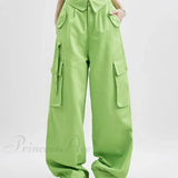 Vaqueros boyfriend verdes elegantes y holgados con botones.