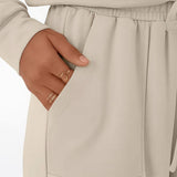 Conjunto casual chic de dos piezas con bolsillos y cordón, color liso.