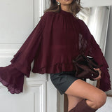 Blusa vintage de gasa con volantes