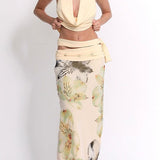 Conjunto de falda larga estampada sexy con espalda ajustada y espalda abierta.