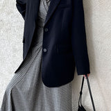 Blazer con espalda abierta y corte relajado