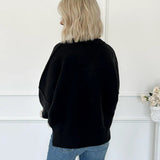 Sudadera oversize con paneles y lazo 3D