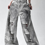 Vaqueros tie-dye rotos de pierna ancha