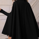 Elegante abrigo de lana cruzado de largo medio con un corte relajado y ajustado.