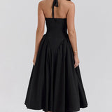 Vestido de noche sin espalda con tirantes y pajarita