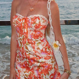 Vestido bandeau ajustado con estampado sexy para las fiestas.