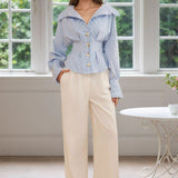 Blusa de rayas con cuello con volantes y mangas abullonadas