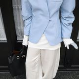 Blazer azul casual con mangas largas