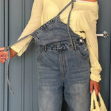 Mono de mezclilla vintage descolorido con piernas anchas