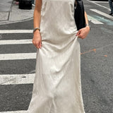 Vestido largo holgado de lino y algodón color caqui con tirantes finos