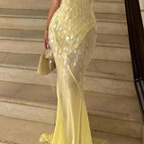 Vestido largo sirena con lentejuelas y escote en pico