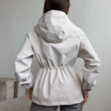 Chaqueta impermeable con capucha y cordón, corte holgado, informal, para senderismo al aire libre.