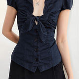 Blusa preppy con pajarita y botones para ir al trabajo