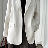 Blazer con espalda abierta y corte relajado