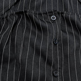 Blusa de rayas con cuello abotonado y mangas largas caladas