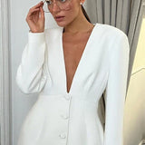 Conjunto de dos piezas de blazer y pantalón blanco con escote en V profundo para la oficina