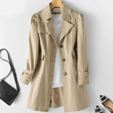 Gabardina elegante y estilosa de longitud media para mujer.