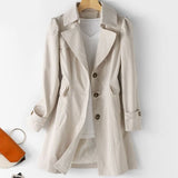 Gabardina elegante y estilosa de longitud media para mujer.
