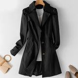 Gabardina elegante y estilosa de longitud media para mujer.