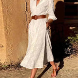 Vestido midi de cuadros, cinturón abotonado, bolsillo elegante y manga larga.