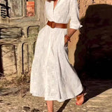 Vestido midi de cuadros, cinturón abotonado, bolsillo elegante y manga larga.