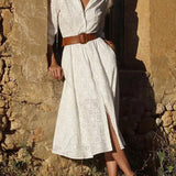 Vestido midi de cuadros, cinturón abotonado, bolsillo elegante y manga larga.