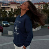 Sudadera estampada elegante con cuello redondo y mangas largas extragrandes.