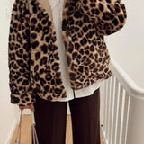 Abrigo reversible de algodón con estampado de leopardo y un elegante cuello vuelto