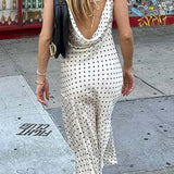 Vestido con abertura y cuello vuelto de lunares