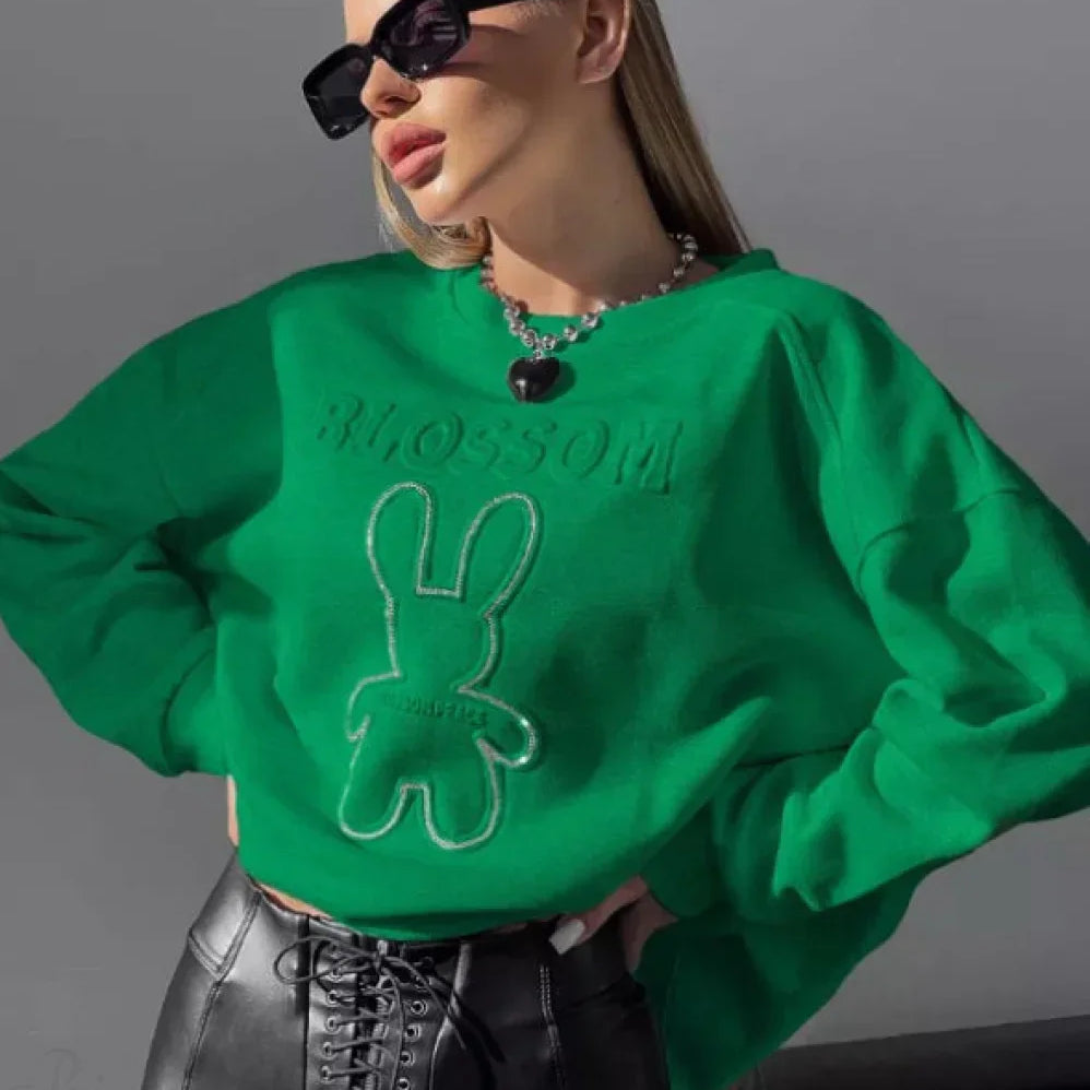 Sudadera elegante de gran tamaño con cuello redondo y motivo de conejo en relieve.