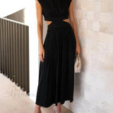 Encantador vestido midi de vacaciones con corte en la cintura y bolsillos.