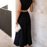 Encantador vestido midi de vacaciones con corte en la cintura y bolsillos.
