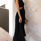 Encantador vestido midi de vacaciones con corte en la cintura y bolsillos.
