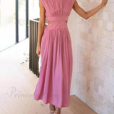 Encantador vestido midi de vacaciones con corte en la cintura y bolsillos.