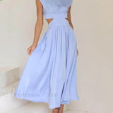 Encantador vestido midi de vacaciones con corte en la cintura y bolsillos.