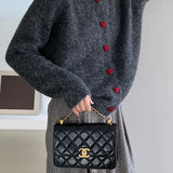 Cárdigan oversize con botones en forma de corazón y cuello redondo