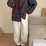 Chaleco oversize con pompones