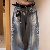 Vaqueros de pierna ancha bordados con letras florales Y2K