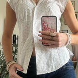 Blusa versátil a cuadros rojos y blancos