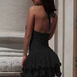 Vestido de noche con tirantes, botones en la espalda y escote pronunciado