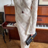 Vestido largo de punto jacquard con estampado de rombos y mangas largas